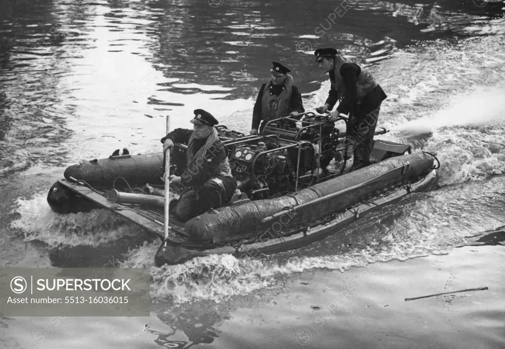 "Bikini" Fire Service Transportable Water Unit. The "Bikini" on the River Mole, propelling itself by water jet from feather weight pumps on board. The provision of water is the first essential for fire fighting. In the emergency preparations the Home Office had, therefore, to consider by what means supplies of water for this purpose could be maintained when normal supplies were for one reason or another not available. From easily accessible sites there would be no difficulty but from those where the water is inaccessible to ordinary pumps and to meet situations such as was encountered in the raid on London in December 1940, where the water failed because of the exceptionally low tide, the "Bikini" unit was developed. October 27, 1954. (Photo by Fox Photos).