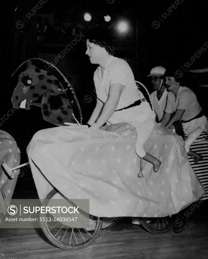Horse Women Play "Polo" - Making up with their own determination what their mounts lack in grace are horsewomen Pat Smythe (left) and lady Mary Williams, in the thick of an indoor "Polo" match at the lords taverners ball, Grosvenor house, London, October 18. October 19, 1954. (Photo by Associated Press Photo).