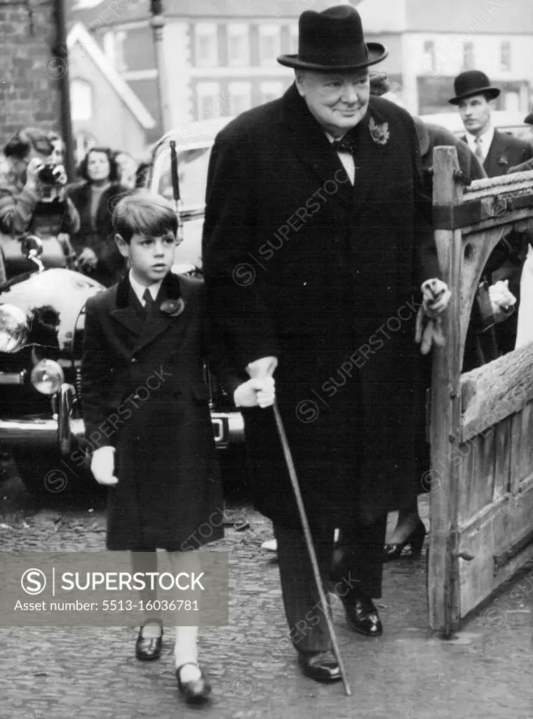 Sir Winston At Grand-Daughter's Christening. Young Nicholas Soames Clutches grandfather's finger as he arrives at Westerham Parish church today with Sir Winston Churchill.. The Prime Minister, Sir Winston Churchill attended the Christening of his youngest grandchild at Westerham Parish church today. The baby is the daughter of captain Christopher Soames, M.P. and Mrs. Soames (formerly Mary Churchill) and was Christened Charlotte Clement. November 6, 1954. (Photo by Paul Popper Ltd.).