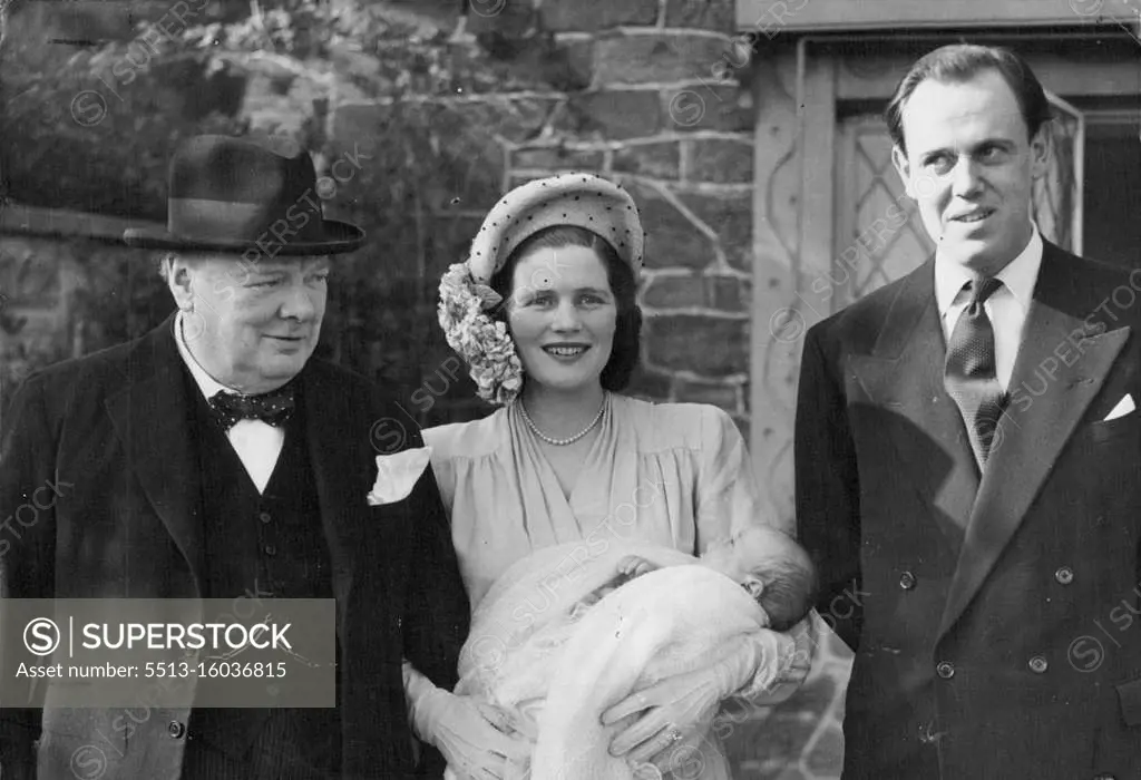 Churchill's Fifth Grandchild Christening -- Captain and Mrs. Christopher Soames, Mr. Winston Churchill and newly-christened Arthur Nicholas Winston Soames pictured at the Christening party which followed the service at Westerham to-day. (Sunday). Mr. and Mrs. Winston Churchill were present at Westerham Church, Kent, to-day (Easter Sunday) for the christening of their grandchild, Arthur Nicholas Winston Soames, first child of their daughter Mary, who in February 1947 was married to Captain Christopher Soames. March 28, 1948. (Photo by Reuterphoto).