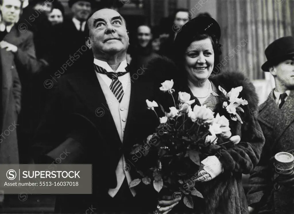 George Robey Marries his business Manageress. The famous comedian marries Miss Blanche Littler (who has been his Business Manageress for a number of years) at Marylebone register office, London. Leaving after the ceremony. November 30, 1938. (Photo by Sport & General Press Agency Limited).