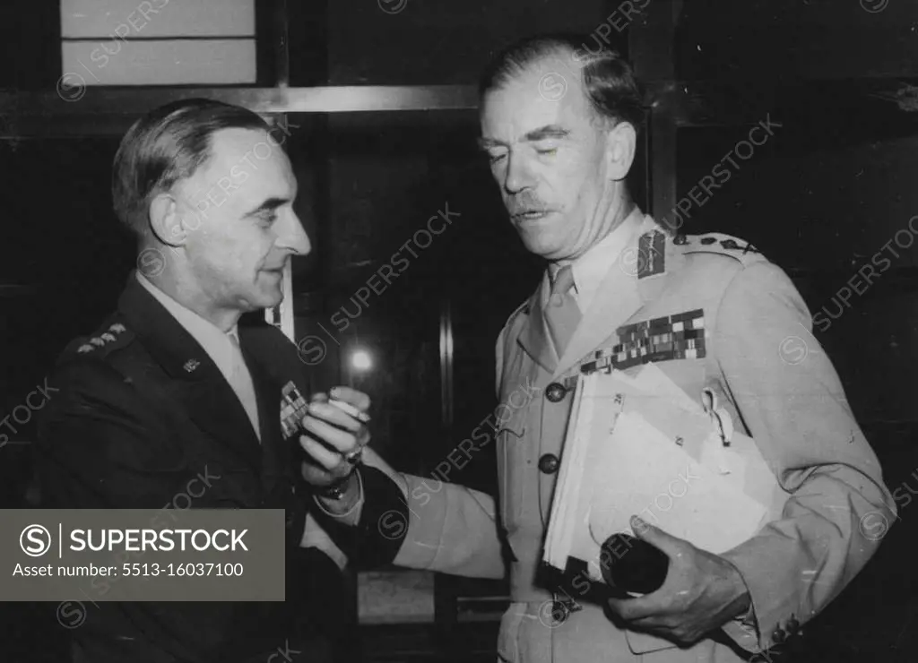 Allied Military Governors Confer -- General Sir Brian Robertson, British Commander-in-Chief, Germany (right) conferring with General Clay, United States Military Governor (left) at the Frankfurt IG Farben Building, following a conference with the German Ministers with whom agreement was reached on the London communique concerning the establishment of a Western German Federalised Government. July 28, 1948.