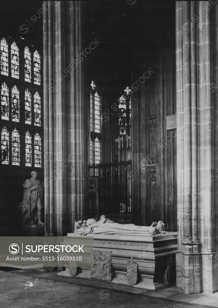 Permanent Tomb Of King George V. At Windsor - The Tomb of King George V in the nave of St. George's Chapel Windsor. It is immediately apposite the memorial to the Duke of Kent, father of Queen Victoria and great grandfather of King George V. Surmounting the tomb which has been designed by Sir Edward Lutyens P.R.A. is the recumbent figure of King George V. bearing the uniform of an Admiral of the Fleet, and Garter robes. The figure, in white marble, is the work of Sir William Reid Dick.R.A. March 12, 1939. (Photo by Sport & General Press Agency Limited).