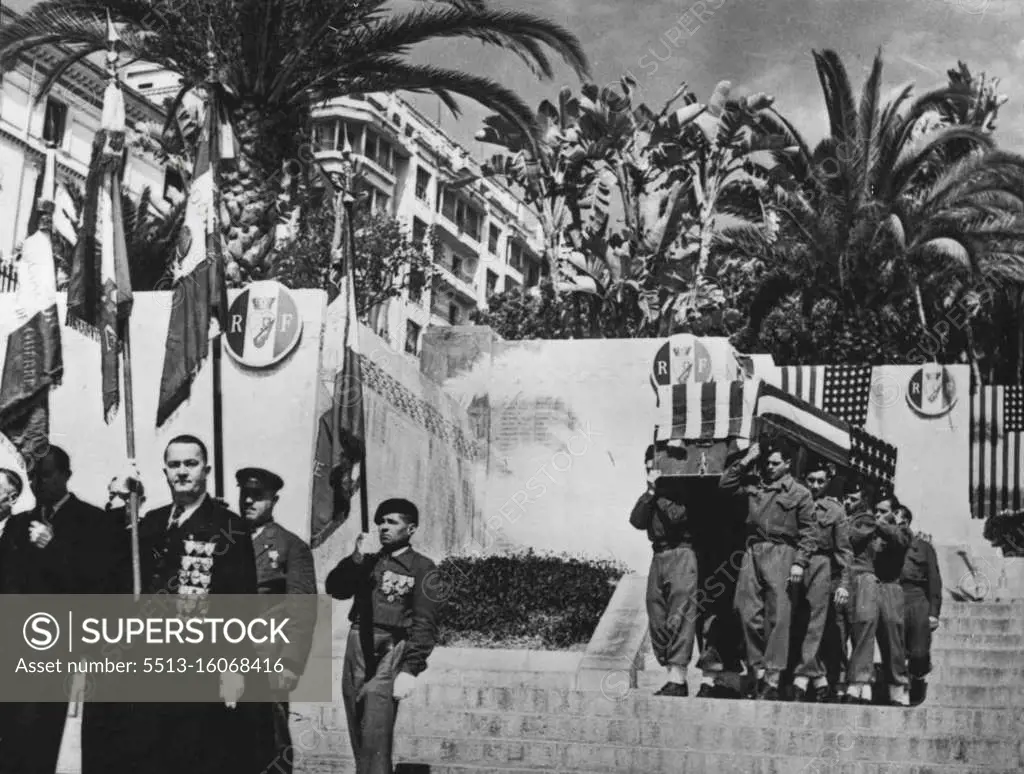 American Honours Her War Dead -- French ex-Service men escort the coffins  being carried to the transport 