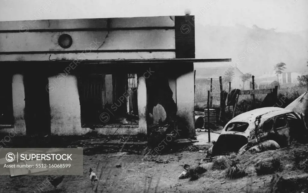 Durban trail of disorder A typical scene in the Non-European quarter of Durban, South Africa, after the fierce Racial riots between Indians and South African natives, in which 105 people were killed, last weekend. The picture shows looted and burned Indian stores at cater manor, Durban. A wrecked automorile lies in foreground. February 09, 1949. (Photo by Associated Press Photo).