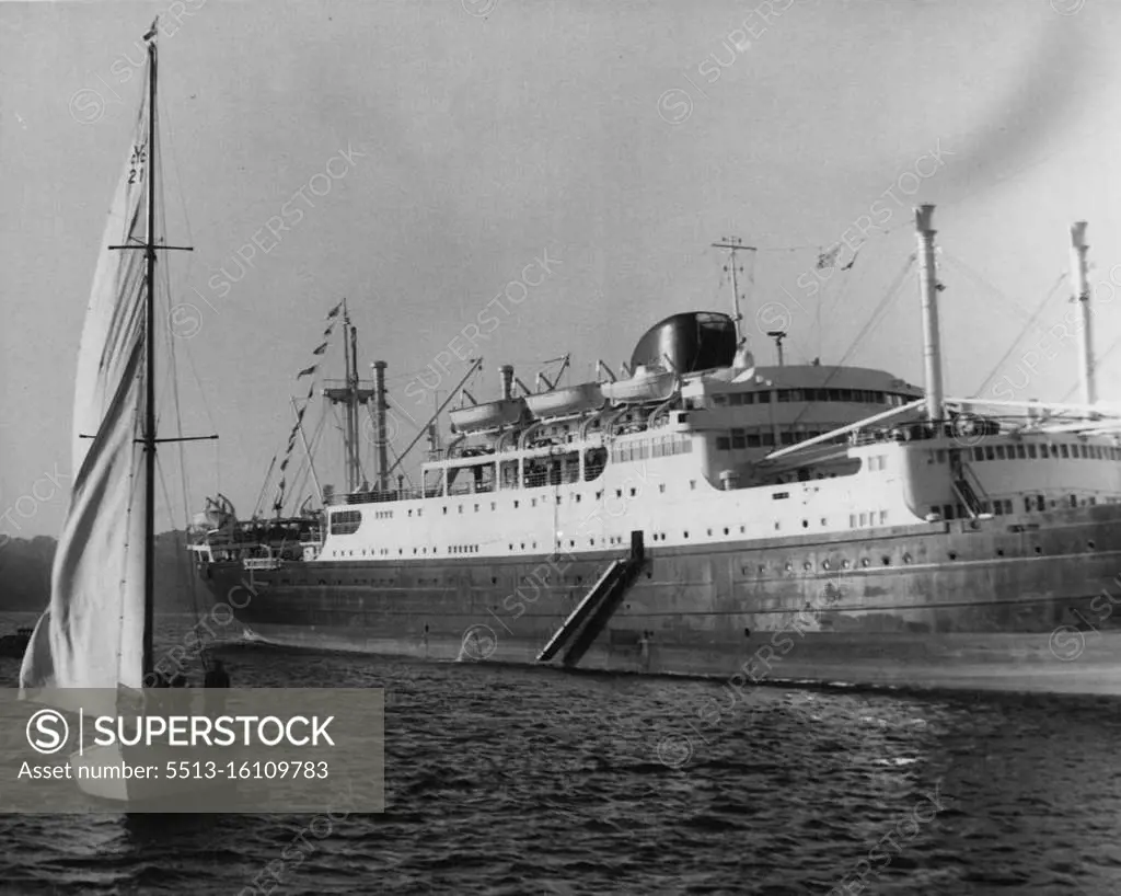 Tahitien Arrives On Maiden Voyage - The French liner Tahitian is welcomed to Sydney by this yacht when it arrived today on its Maiden voyage from France. June 25, 1955. (Photo by George Lipman/Fairfax Media).