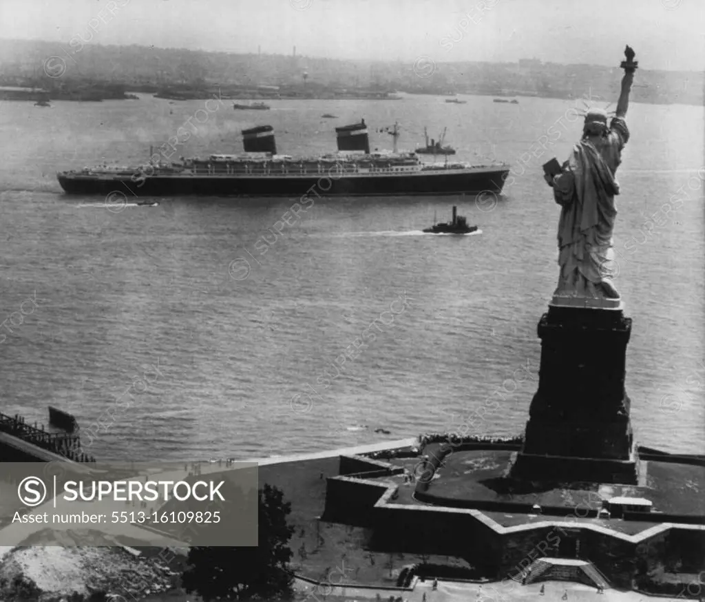 Miss Liberty Waves Bon Voyage -- America's newest and largest liner-- the United States-- stems past the Statue of Liberty and heads toward open sea on her maiden voyage to Europe yesterday. The 53,000 - ton superliner carried 1660 passengers on what may be a record Atlantic Ocean crossing. The current eastward record was set in 1938 by the British liner Queen Mary which made the crossing in three days, twenty hours and forty-two minutes. July 4, 1952. (Photo by AP Wirephoto).