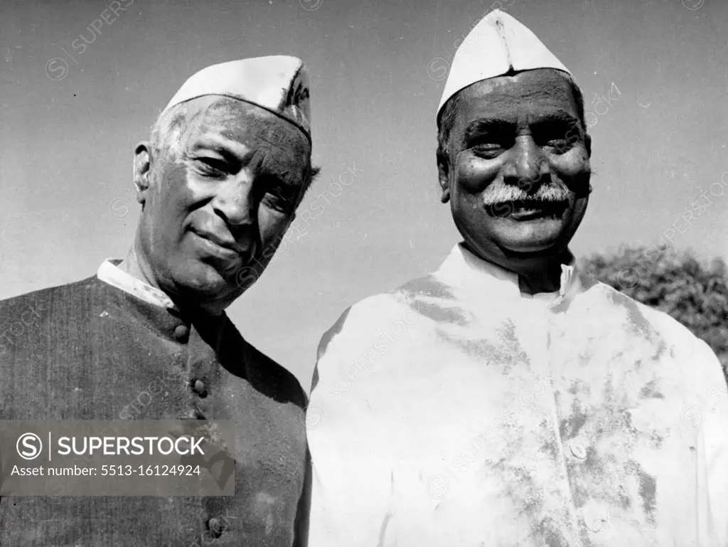 The best of Friends -- Indian President Rajendra Prasad (right) and Indian Premier Jawaharlal Nehru - The Best of Friends, really - were up early on March 9 to throw coloured powders and coloured waters at each other. It was all part of the festival of Holi - Marking the advent of summer - and all New Delhi was at it. The day closed with the traditional processions to the nearest river for community bathing. March 24, 1955. (Photo by Associated Press Photo)