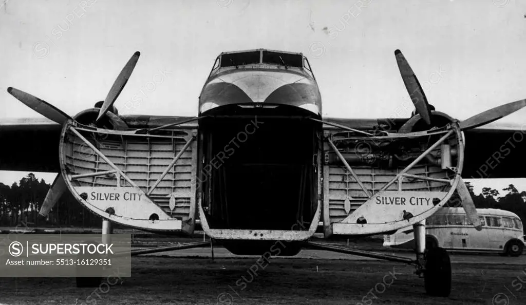 The ample freight area of the planes admirably suits Powell. In it he can pack cars or tons of cased produce for speedy and safe delivery. March 25, 1953. 