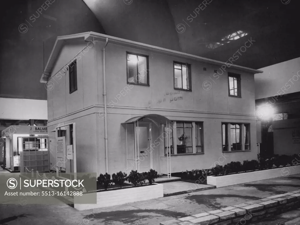 The New Homes of England. The new Two-Storey House erected of Aluminiuim seen for the first time after its erection. Completely fitted sections are turned out from the factory and removed to the site by lorry, thus allowing for easy and speedy erection. New types of houses are to be seen at the Great Ideal Home Exhibition now being held at Olympia, London. This section of the exhibition has been organized by the Ministry of Health and is part of its town and country homes plan for 1948. May 22, 1948. (Photo by Sport & General Press Agency, Limited).