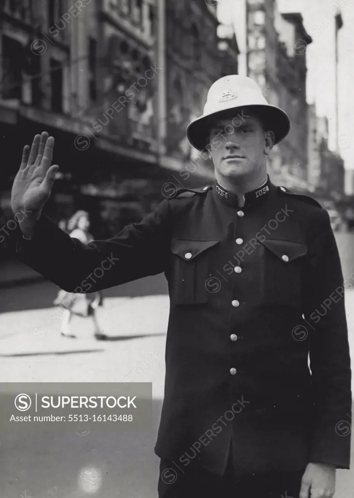 Traffic Constable Wally Keeves warning his summer ***** on duty Marky and Pitt. St. October 03, 1946.