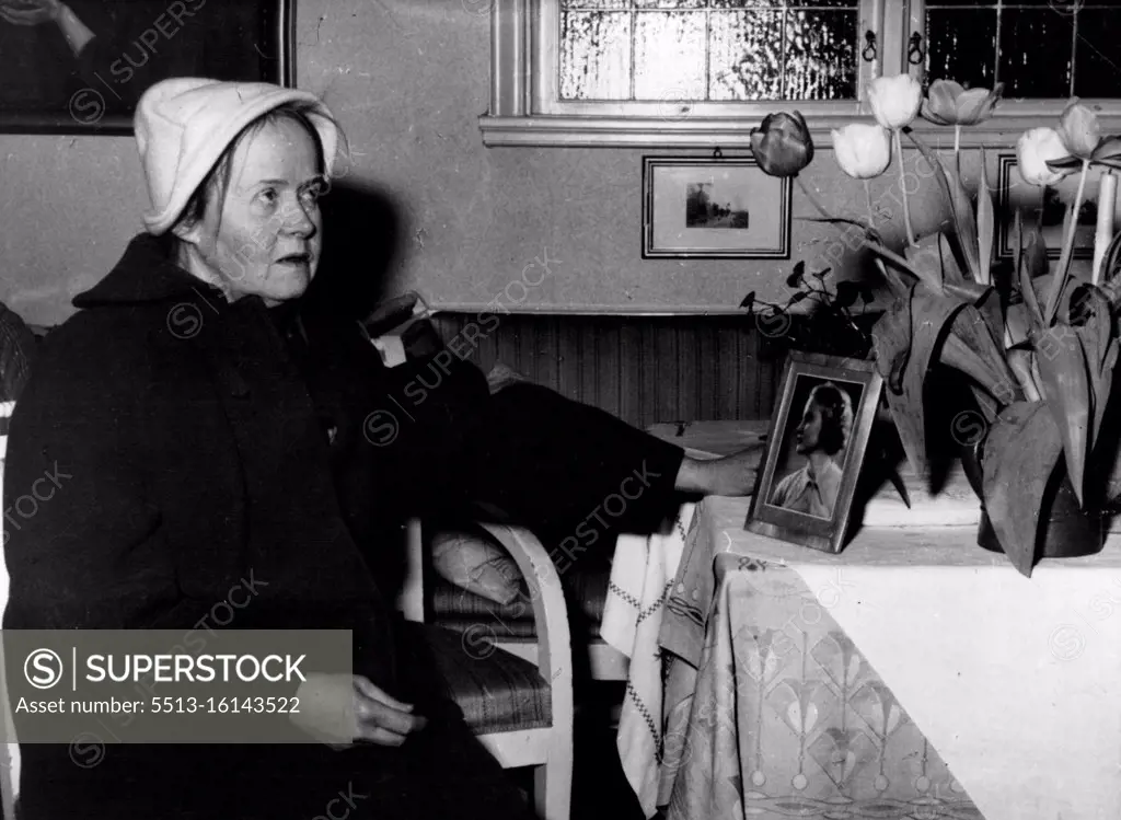 Pontecorvo's Mother-In-Law Now Hopes For News Of Daughter - Mrs. Nordblom with a portrait of her daughter, Mrs. Marianne Pontecorvo. For five years Mrs. Gerda Nordblom, 70, mother of Marianne Pontecorvo, the Swedish born wife of atom scientist Bruno Pontecorvo, has had no news of her daughter. Now that news has been released of the families whereabouts and the fact that the scientist is working for the Russians, she hopes to hear of the well being of her daughter and her family. March 3, 1955. (Photo by Paul Popper Ltd.).