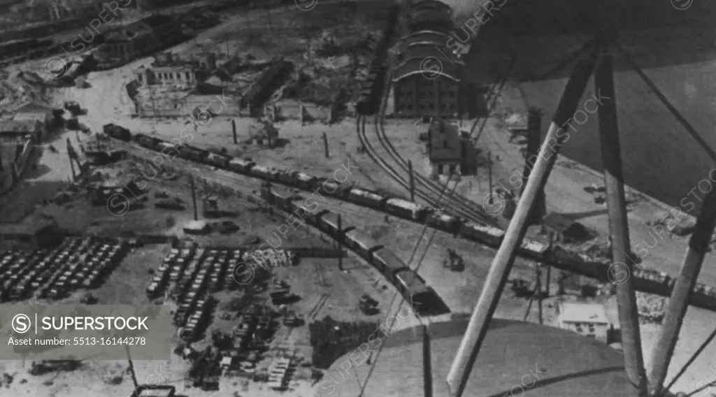 Trains, Automobiles Among Russian Booty At Odessa -- here are Some of the trains and Automobiles which the Germans left behind in Odessa when the Russians captured the city April 10. Photo was received in New York By Radio from Moscow April 17. April 17, 1944. (Photo by Associated Press Radiophoto). 