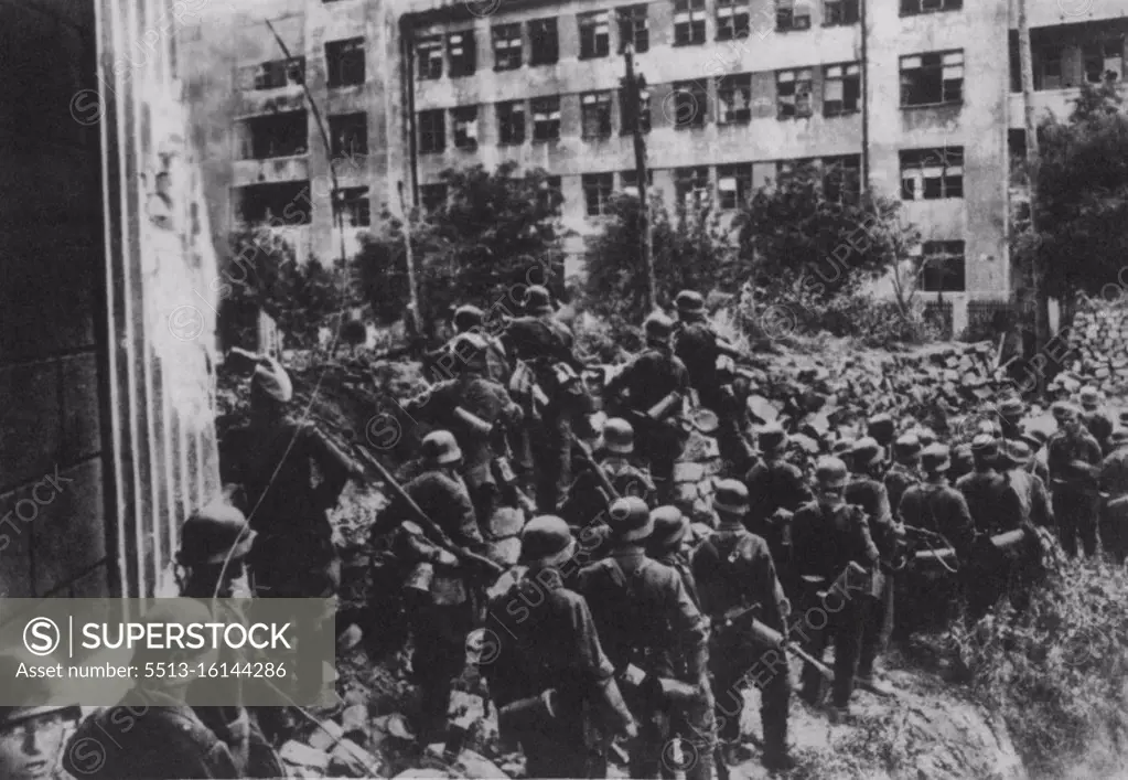 The Full Story Of The Fall Of Rostov -- Mere infantry being brought into the action. under the cover of street barricades. These pictures tell the full story of the fall of Rostov of the violence of the attack, of the dogged resistance; how every street was turned into a stronghold from which the Russians exacted heavy tell of the attackers and how finally they have been overwhelmed by the sheer weight of metal. December 7, 1942. (Photo by Keystone).