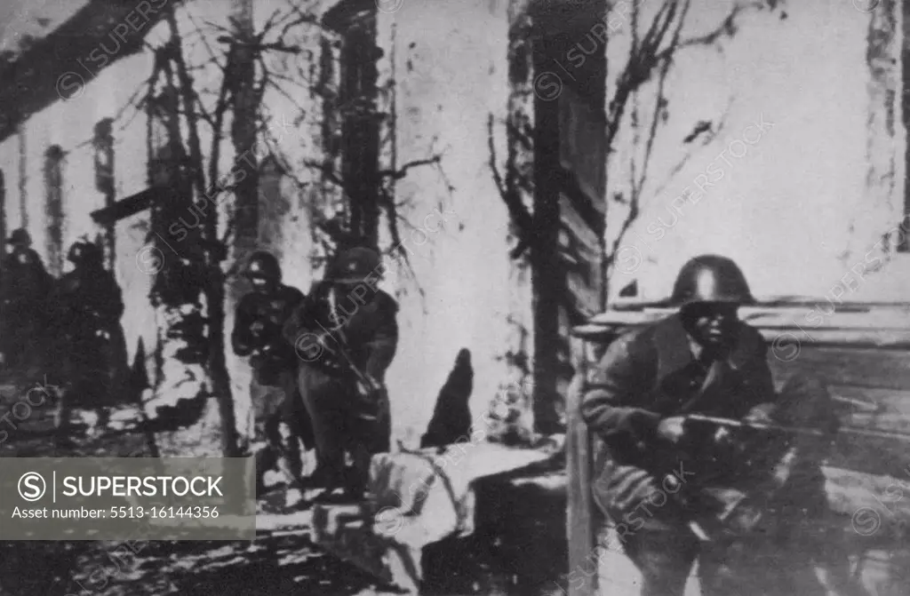 Red Troops On Alert In Stalingrad -- With guns at the ready position, Russian Troops Reconnoitre an area in the outskirts of Stalingrad. Moscow reported today the city's defenders have repulsed heavy attacks made by two fresh German divisions. October 25, 1942. (Photo by AP Wirephoto).