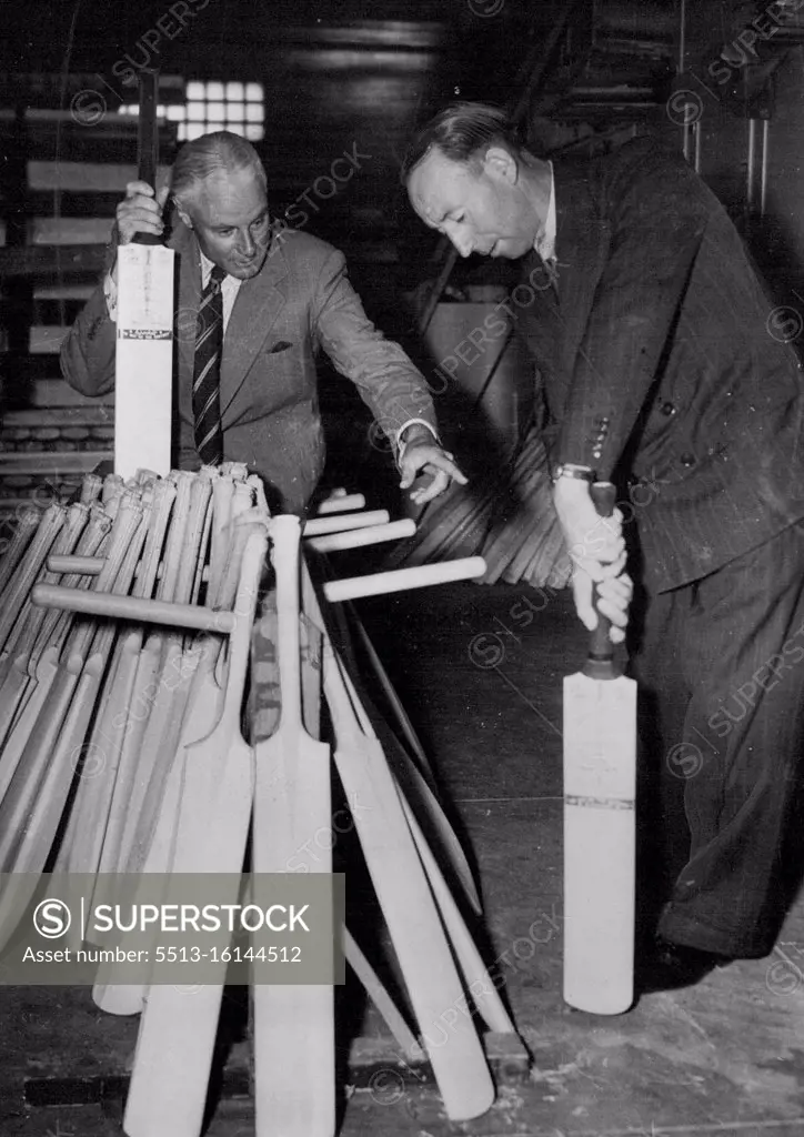 Australian Test captain Lindsay Hassett tests a bat specially made for him with a short handle for balance. Hassett will use the bat in the fourth Test at Adelaide, next month. January 20, 1951.