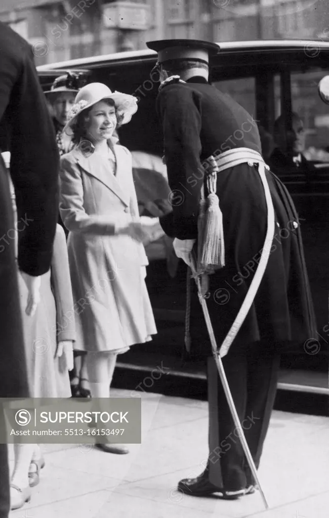 Royal Princess Attend Royal Tournament -- Princess Elizabeth being received on arrival. Queen Mary took Princess Margaret Rose and Princess Elizabeth to witness the Royal Tournament at Olympic this afternoon (Mon). June 13, 1939. (Photo by London News Agency Ltd.).