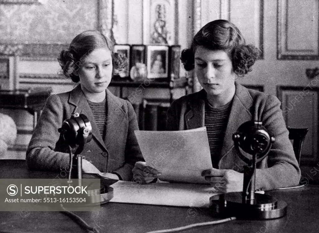 Royal Princess At The Microphone -- Princess Elizabeth and Princess Margaret at the microphone. Princess Elizabeth made her first broadcast to-day. October 12, 1940. (Photo by Topical Press).