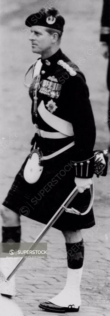 Highlander Duke. The Duke of Edinburgh, wearing the uniform of Colonel-in-Chief of the Cameron Highlanders, pictured when with the Queen he visited Edinburgh Castle. June 28, 1953. (Photo by United Press Photo).