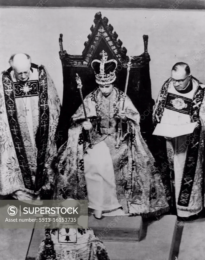 Coronation of Queen Elizabeth II -- Queen Elizabeth II seated in King Edward's Chair during the Coronation ceremony in Westminster Abbey. Facing her is the Archbishop of Canterbury. Over her long robe the Queen wears a cloth of gold. June 2, 1953. (Photo by Planet News Ltd.).