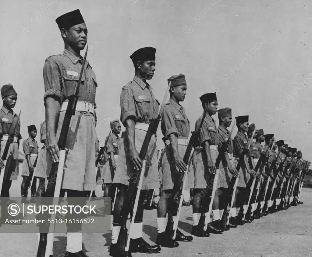 Recruits at musketry drill on the parade ground. May 01, 1950. (Photo by British Official Photograph).