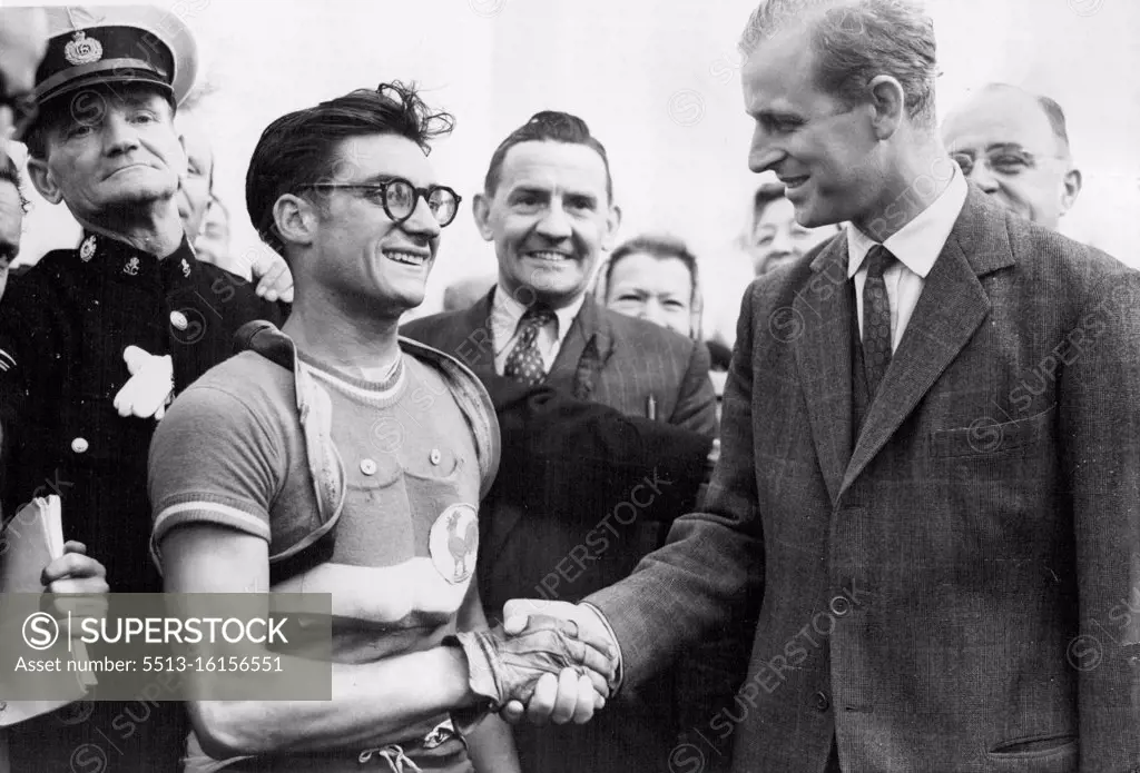 Olympic Games - France Wins Cycle Road Race At Windsor -- The Duke of Edinburgh shakes hands with J. Beyaert of France who won the gruelling 20-mile cycle road race at Windsor today (Friday) There were twenty five nations represented in the event which was started this morning by the Duke of Edinburgh. August 13, 1948. (Photo by Reuterphoto).