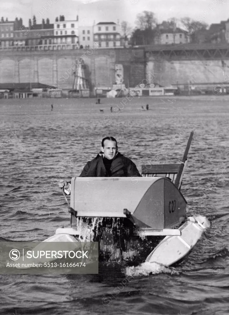 Off On Trio-Way Fedal Crossing Of The Channel: Mr. Jacquise Du Preaire Pedalling away from Ramsgate at the start of his Channel-crossing to-day. Mr. Jacquise du Preaire, 30-year-old ex-Commando of Goring-on-Sea, Sussex, set off from Ramsgate, Kent, to-day (Sunday) on a double crossing of the Channel by pedal-craft. He is wearing a new type of life-saving suit which is water-and wind-proof and holds the heat. It will blow up like it ***** if he falls in the water. Mr. du Preaire, to make Calais in eight to ten hours. He plays to continue from there along the French coast to Le Kavre and re-cross the Channel to Southesea, making a total of 260 miles. January 25, 1953. (Photo by Reuterphoto).