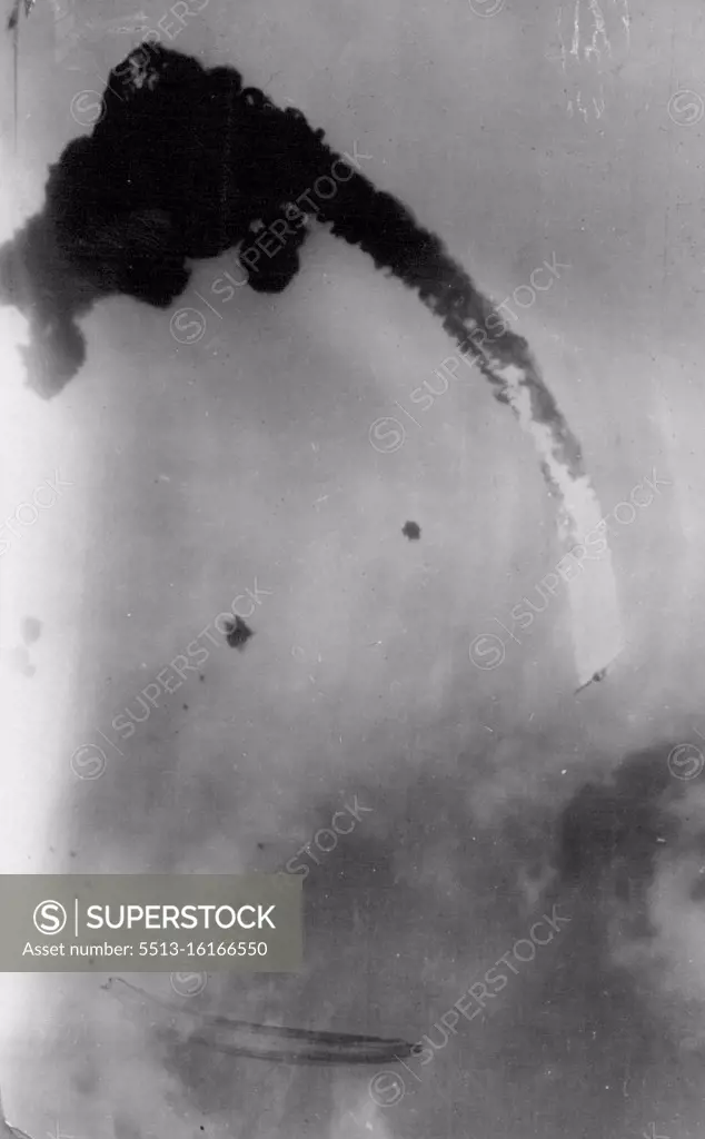 Japanese Bomber Hit By U.S. Anti-Aircraft Fire off Ryukyus (Loochoos) -- A blazing Japanese dive bomber, trailing a plume of smoke plunges toward the sea after being hit by anti-aircraft fire from a U.S. carrier off the Ryukyu (Loochoo) Islands March 18, 1945. A heavy air and naval bombardment of the islands preceded U.S. Tenth Army landings on Okinawa, main island in the Ryukyu group, on March 31. One day later the American troops had advanced three miles (4.8 kms) inland and captured the Yontan and Katena airfields. Okinawa is 363 miles (579 kms.) from the Japanese home islands. It is the doorway to the East China Sea and a Principal link in the southern chain of Japan's home defense system. April 20, 1945. (Photo by U.S. Office of War Information Picture).