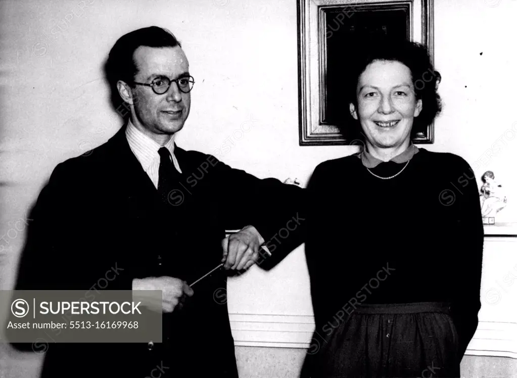 ***** Britain -- Sir Edwin Plowden, photographed with his wife Lady Plowden at their flat. Mr. Attlee announced in the commons to-day ***** Sir Edwin Plowden has accepted she post of the Government's chief planning officer. He is 40 ***** director of ***** and was chief executive of the Ministry of Aircraft production in 1945-46. June 17, 1947.