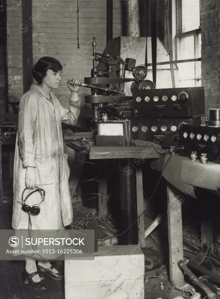 The Only Woman Radio Engineer In The World -- She is Mrs. Edward M. Munzer of Hewlett, L.I. who enjoys the distinction of being the only woman radio engineer in the world. She is a graduate of the Massachusetts institute of technology with the degree of electro chemical engineer. During the war, Mrs. Munzer took a special radio course at Hunter College, N.Y., and was granted a grade "A" license as wireless operator. She was later appointed government inspector at the deforrest radio station at Highbridge, N.Y., where she remained through the period of the war making various experiments and tests. May 3, 1923. (Photo by International News Photos).