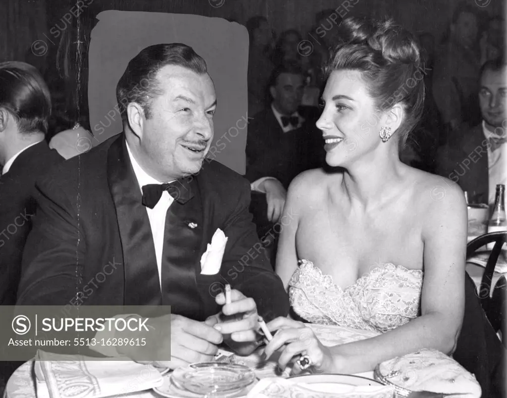 His Future Queen - Xavier Cugat, called by many the "Rhumba King", photographed with his future "Queen" Lorraine Allen. The couple are shown in the Wedgwood Room of the Waldorf Astoria shortly after Miss Allen announced her forthcoming marriage to the musician. The wedding will take place in Beverly Hills, California, in October, when his divorce from His former wife, Carmen Castillo, become final. April 24, 1947. (Photo by Wide World Photos). 