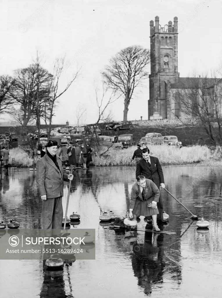 Curlers in The North The 30-rinks-a-side Bonspiel between Cupar and East Fifo provinces of the Royal Calodonian Curling Club, was held on Kilconquhar Loch, Fife. Picture shows a general view, with Kilconquhar Church in the background. December 6, 1952.