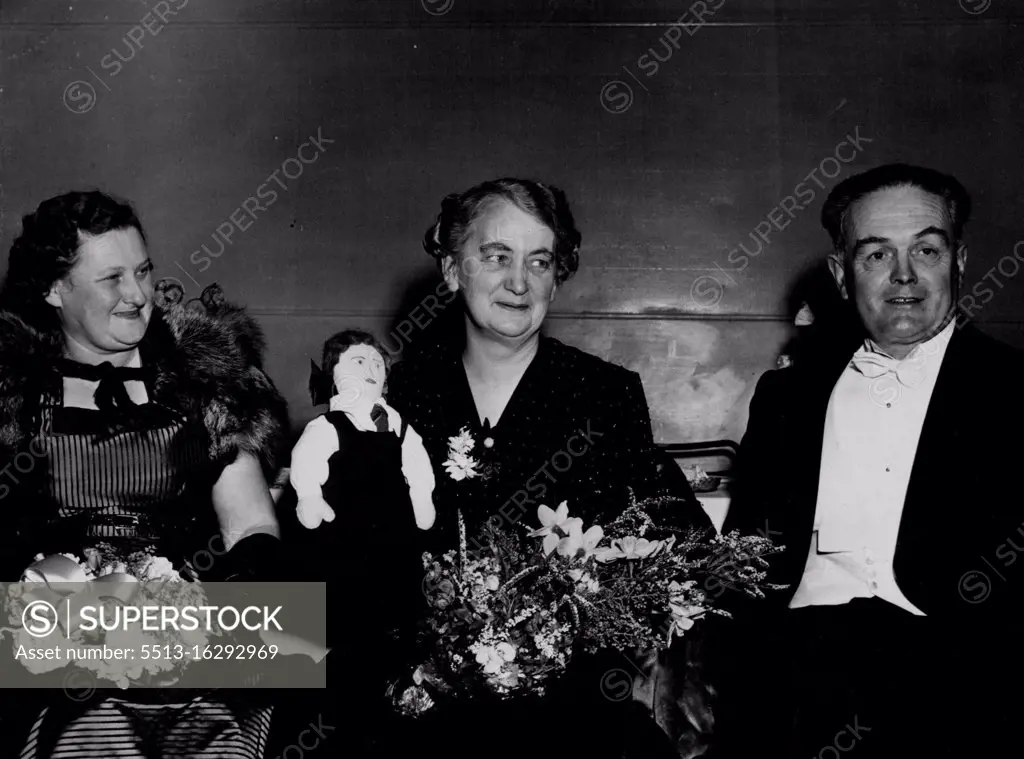 Old Student's Association President Mrs. A.J. Husband and PLC head mistress Miss M.F.B. Neilson with School Council Chairman Mr. Justice Dean. There were 10 debutantes at the annual ball arranged by old students of Melbourne Presbyterian Ladies College at St. Kilda Town Hall. August 22, 1952.