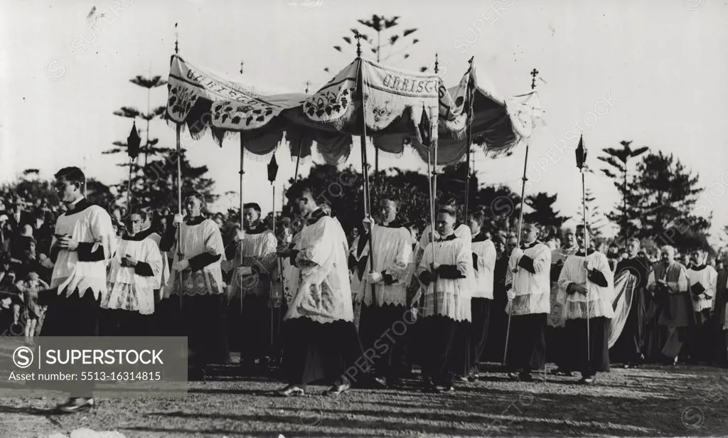 The Host, under a beautiful canopy, carried in the Manly Corpus Christi procession. June 17, 1931. 