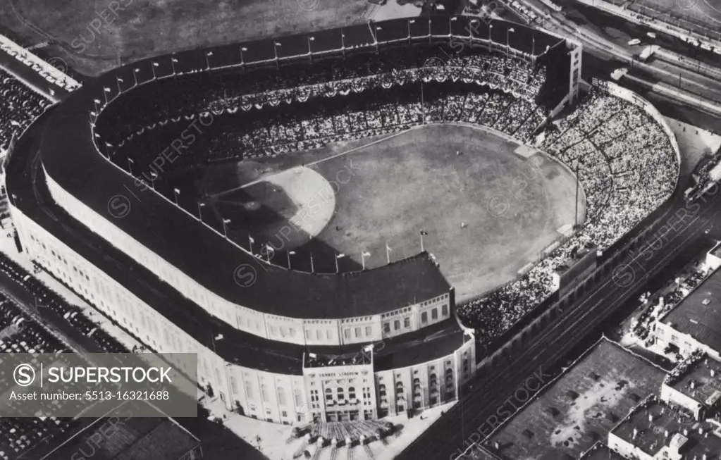 Series Crowd Sets A Record -- An Air view of Yankee Stadium during the World series opener today in which the Yanks defeated the Dodgers, 3 to 2. Official paid attendance was announced as 68,540 and total receipts as $265,396 both new records for a World Series Game. October 01, 1941. (Photo by AP Wirephoto).