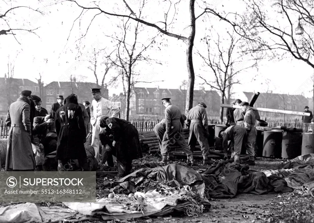 Military Camp at Clapham Common Troops and German P.O.W.'s fitting up field kitchens on Clapham Common today. Troops and German Prisoners-of-war, set up a complete Army ***** from which will be directed the ***** to feed London, during the present strike. January 30, 1941. (Photo by LNA)