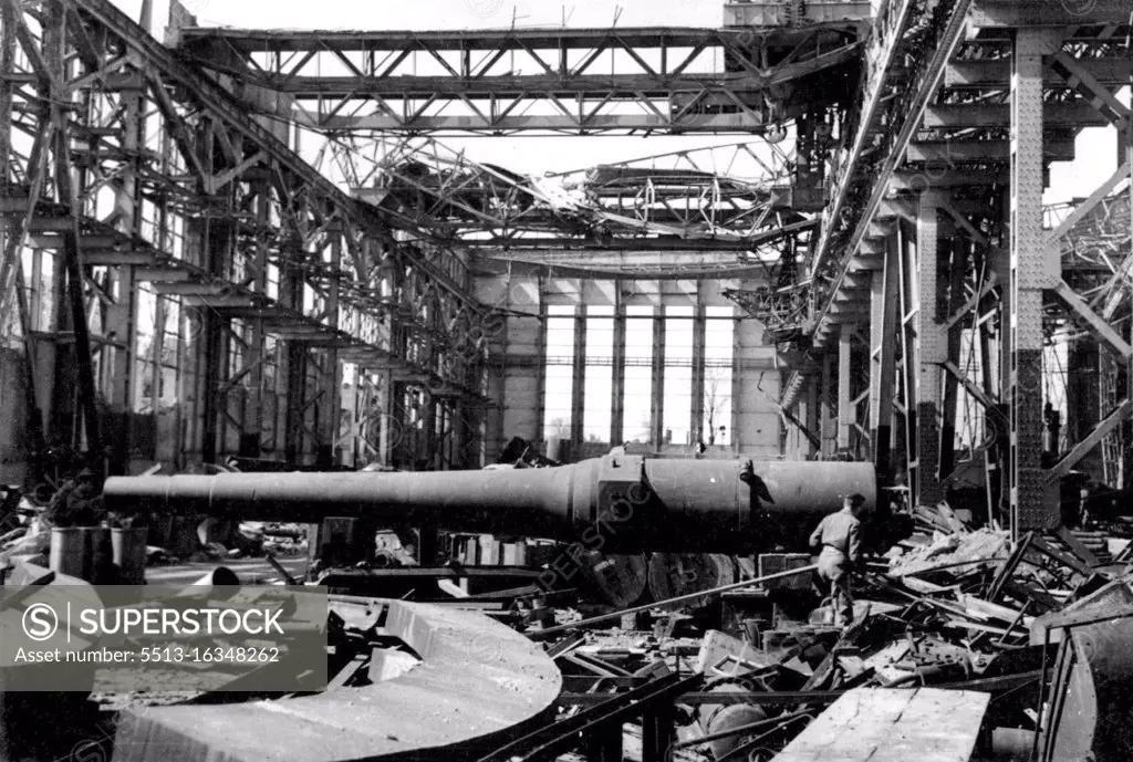 Captured Essen - The Siege gun which was never fired. First Pictures Inside Krupps. This picture taken by a Rap official photographer on April 11th, 1945, shows an interior view of the devastated Krupps works at Essen, one of RAF Bomber Command's chief targets during the War. May 21, 1945.