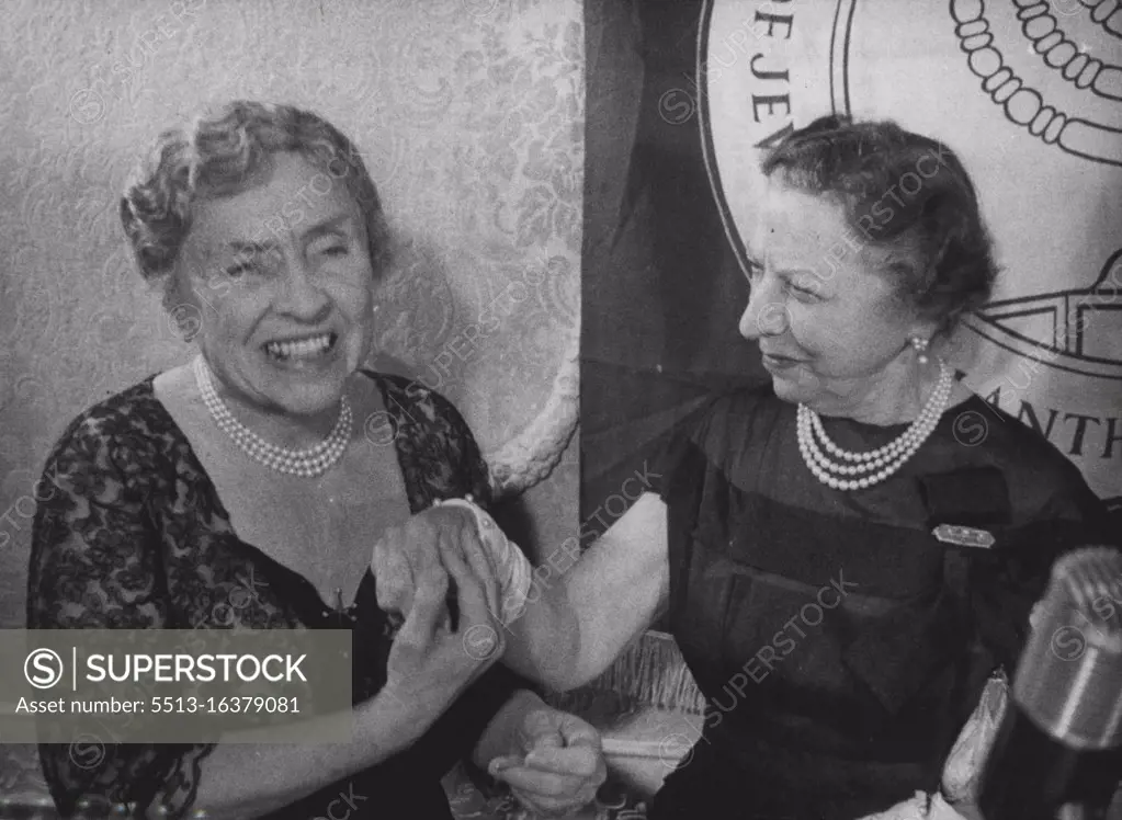 New Honour For Helen Keller -- Helen Keller, at the ***** in New York at which she was acclaimed "Woman of the years. Helen Keller, 74-year-old American, who has been blind & deaf Since the age of 19 months as the Result of Illness, has been acclaimed "Woman Of The Illness, has the federation of Jewish Philanthropies" in New York. Miss Keller, who has lectured on behalf of the iron curtain, holds numerous honours for her work in relief of the Handicapped. December 13, 1954. (Photo by Paul Popper Ltd.).