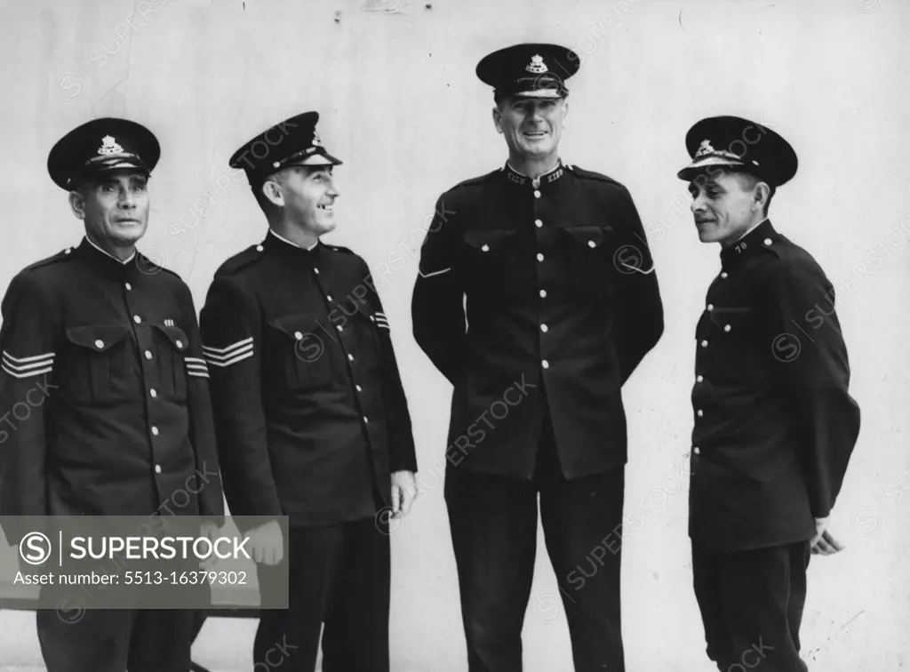 L to R - Sgt. A. Riley (Black Tracker), Sgt. Curran, Con. T. Tanner, Con. L. Kim (Black Tracker). August 13, 1945.