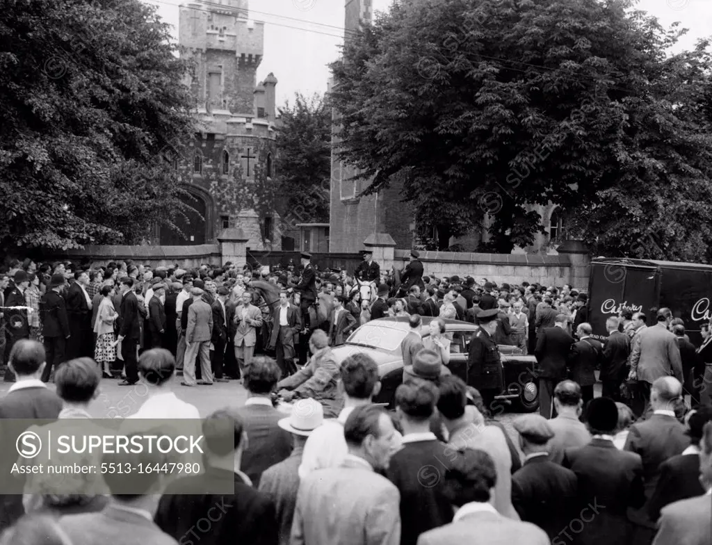 Mounted Police Among ***** At Holloway After Ellis Dies. Mounted Police ride ***** the Surging crowd which awards to read the official notice posted on the gates off Holloway prison, North London, after who execution of Mrs. Ruth Ellis this morning (Wednesday). Mrs. Ellis, 28-year-old model, was condemned to death at the old Bailey for the murder of her lover, racing motorist David Blakely). July 13, 1955. (Photo by Reuterphoto).