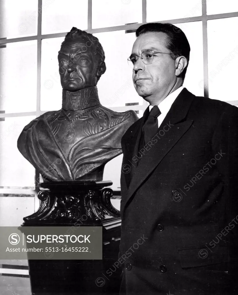 Cities Of The World - La Paz Bolivian President Victor Paz Estenssoro poses in his La Paz officer beside a bust of Simon Bolivar, the great liberator for whom Bolivia is named. Sucre is the legal capital of Bolivia, but the government rules from the more accessible city of La Paz. April 8, 1955. (Photo by United Press).