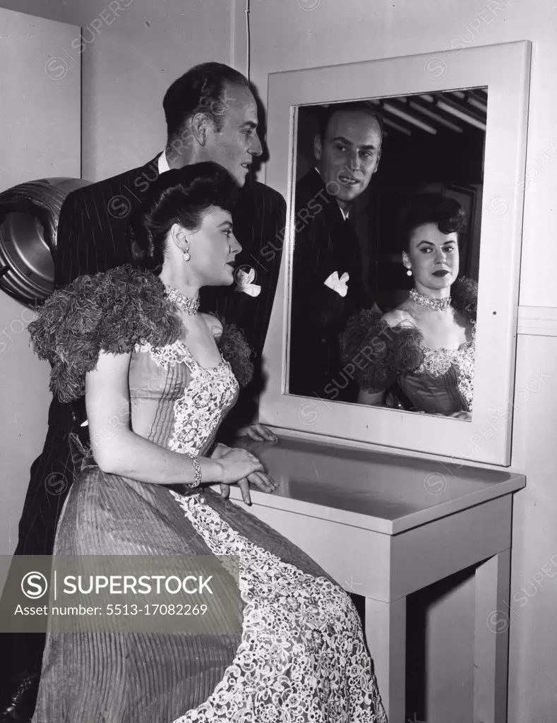 MGM's. famous hair stylist Sydney Guilaroff puts the finishing touches tot eh hair-dress worn by Leona when she was gowned in the costume worn by Kathryn Grayson in "The Kissing Bandit." January 20, 1950.