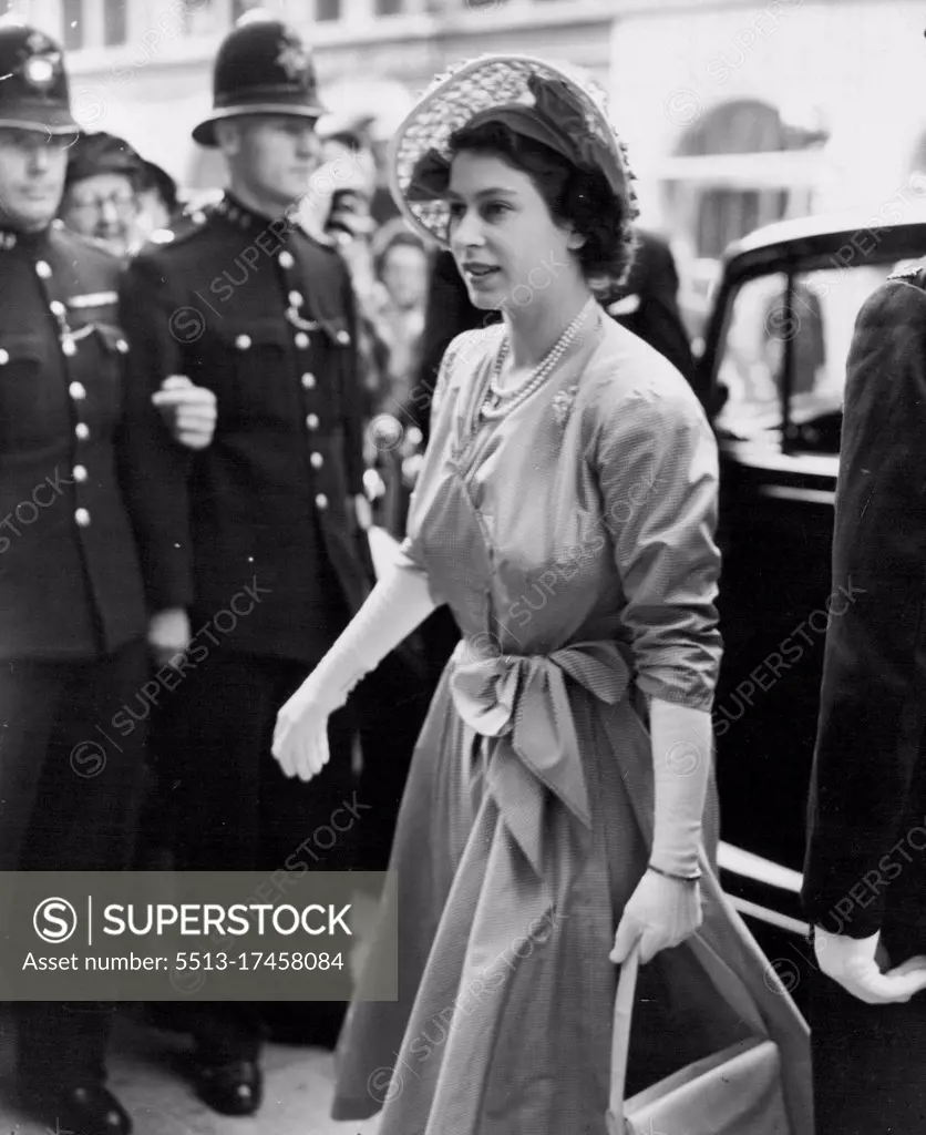 The Princess Pays A Call -- Princess Elizabeth arriving at the Travel Association's Information Centre in Whitcomb Street, London, this morning (Wednesday). Princess Elizabeth this morning (Wednesday) paid a visit to the Travel Association's Information Center in Whitcomb Street, London. July 20, 1949. (Photo by Reuterphoto). 