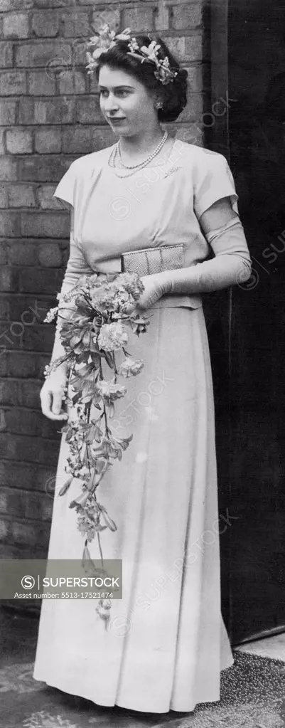 Princess Elizabeth as Bridesmaid. Members of the Royal Family attended the wedding reception of the Hon. A. C.V Elphinstone and the Hon, Mrs V.P. Gibbs at the Savoy Hotel, London. Princess Elizabeth as bridesmaid leaving the Savoy after the reception. May 29, 1946. (Photo by Fox Photos).