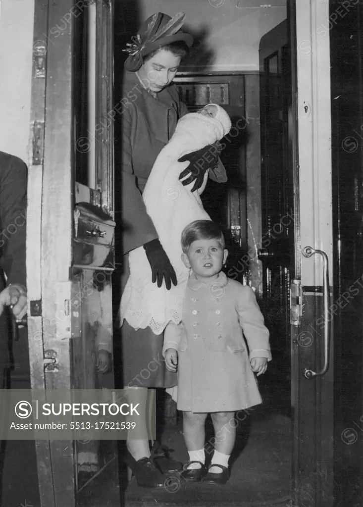 Princess And Babies Leave For Scotland. - London: Princess Charles who will be two in November, gazes with interest at the camera as Princess Elizabeth, and his month-old sister Princess Anne are pictured entering their coaches before leaving King's Cross Station for Balmoral, where they will join the Royal Family. The Princess and her babies travelled in special sleeping coaches attached to a regular London to Scotland train. September 17, 1950. (Photo by Planet News Ltd.)