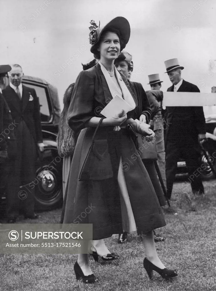 Princess Sees Richest Derby - Princess Elizabeth walks a paddock on Epsom racetrack England, May 2, After seeing French Owner Marcel Boussac Bring off the *****-derby Double. Boussac's Colt Galcador, ridden by Rae Johnstone, won the £17,000 derby by a hear from William Woodward's Prince *****, the Redhot Favourite. Jockey Rode Bolssac's filly Asmena to win the Oaks May 25. Princess At Epsom. Princess Elizabeth walks from the paddock Epsom after seeing French owner Marcel Boussac complete the Oaks-Derby double. Australian "Togo" Johnstone rode both winners-Galcador in Derby, and Asmena in the Oaks. May 27, 1950.(Photo by Associated Press Photo).