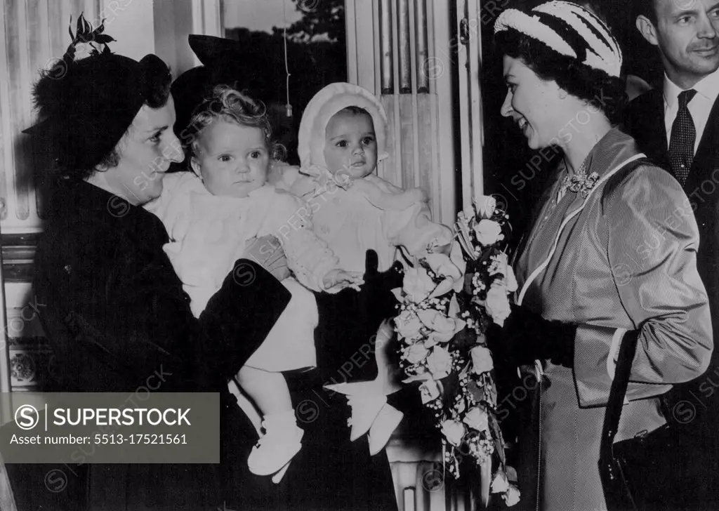 Princess Meets Two Babies Born Same Day as Princess Anne - Worthing: Smiling Princess Elizabeth is introduced to Mrs. Green and her baby Diana Mary, and Mrs. J.Harris and her daughter Mary Joyce, when she visited Courtland Hospital, Worthing, during her tour of the south coast. The two babies were both born on the same day as Princess Anne, youngest child of the same day as Princess Anne, youngest child of the Princess and the Duke of Edinburgh. May 19, 1951.