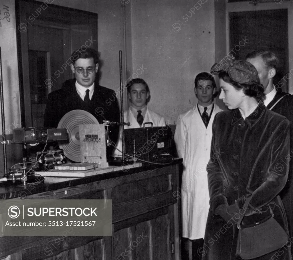 The Queen Visits Shrewsbury School - The Queen looks at an electronic organ in the Elementary Laboratory at Shrewsbury school today. The Queen, accompanied By the Duke of Edinburgh, visited Sherewsbury school today. March 17, 1953. (Photo by Paul Popper).