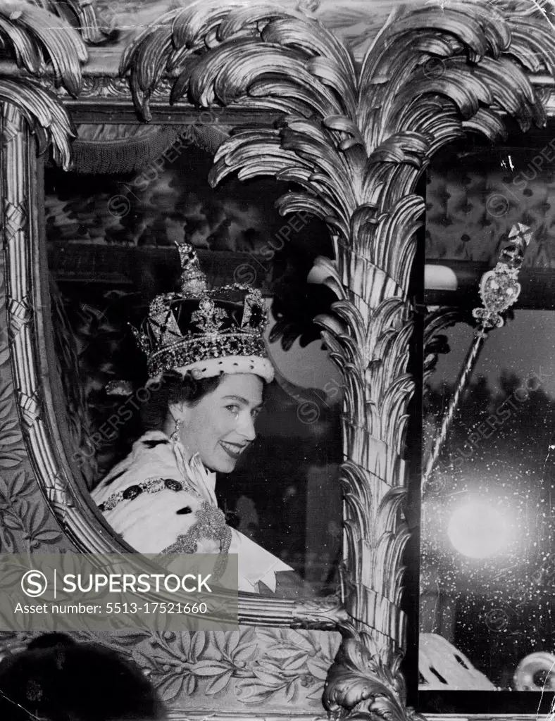 Smiling Queen Returns to Her Home - Smiling happily, the Queen rides in the golden State Coach into Buckingham Palace at the end of her triumphal progress from her Coronation at Westminster Abbey, London, to-day (Tuesday). She wears the Imperial State Crown, carries the Royal Sceptre and the Orb. Smiling Happily the Queen rides in the golden State Coach into Buckingham Palace at the end of her triumphal progress from her Coronation at Westminster Abbey. She wears the Imperial state crown. This picture reached Sydney today by record-breaking Qantas Constellation. June 02, 1953. (Photo by Reuterphoto).