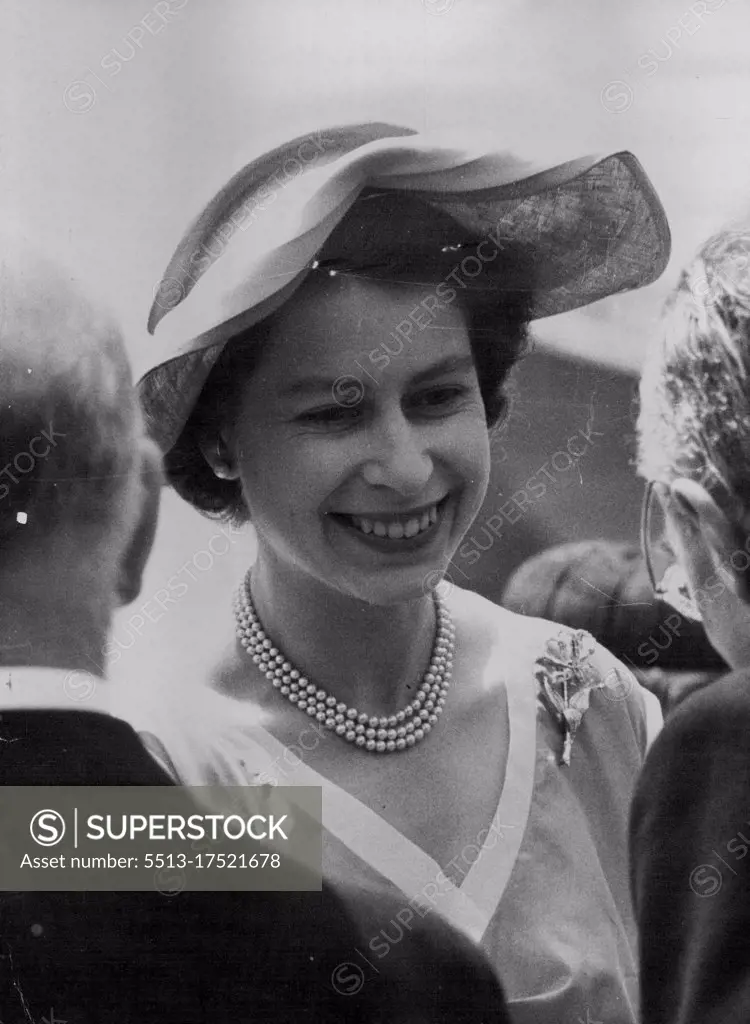 Queen Visits Sealer In London The Queen, in wide-brimmed summer hat, is greeted as she arrives to visit the Norwegian sealer Tottan at Tower Pier, London, to-day (Tuesday). The ship is to carry 25 British explorers to North Greenland. Main objected of the 100,000 expedition will be to test Service equipment under Arctic conditions and seek scientific and geological information. July 1, 1952. (Photo by Reuterphoto).